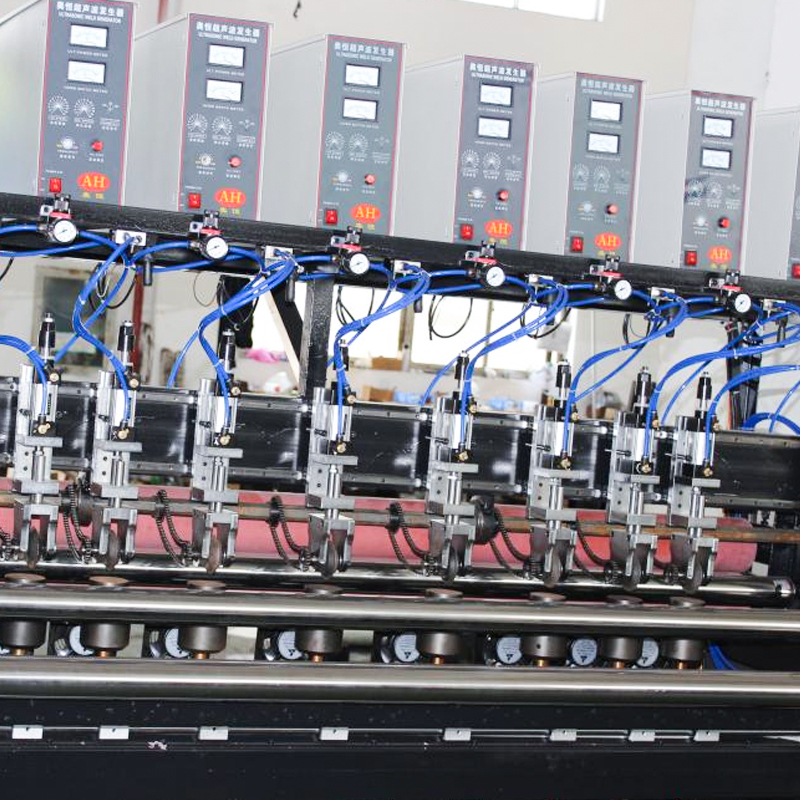 AH-2200 Ultrasonic Slitting and Cross-Cutting Machine AH-2200 Ultrasonic Slitting and Cross-Cutting Machine